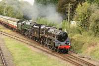 My primary reason for visiting the excellent GCR 2017 Autumn Gala was to see the newly restored BR Standard 5MT 4-6-0 73156. As part of the theme of <I>50th Anniversary - End of Southern Steam</I> it ran as 73084 'TINTAGEL' and is seen here double heading at Quorn & Woodhouse with 9F 2-10-0 92214. <br>
<br><br>[Peter Todd 06/10/2017]