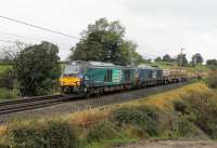 DRS 68017 <I>Hornet</I> and nearly new 68032 take the Sellafield to Crewe flasks south through Bay Horse on Saturday 7th October 2017. <br><br>[Mark Bartlett 07/10/2017]