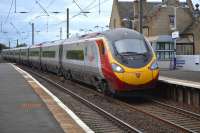 The 08.43 Pendolino from Euston to Edinburgh passes through Kirknewton on 9th October 2017.<br>
<br><br>[Bill Roberton 09/10/2017]