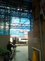 Carlisle station is currently almost unrecognizable, being clad in scaffolding to allow refurbishment of the glass roof.<br><br>[Ken Strachan 01/08/2017]