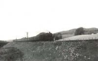 Jubilee 45724 <I>Warspite</I> photographed just west of Dalbeattie heading for Dumfries with the up midday <I>'Paddy'</I> on 16 July 1956. The train has just crossed the River Urr on Barsoles Viaduct. [Ref query 28 October 2017]  <br><br>[G H Robin collection by courtesy of the Mitchell Library, Glasgow 16/07/1956]