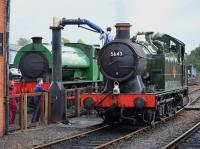 The Furness Railway Trust's GWR 0-6-2T 5643 guested at the Bo'ness & Kinneil Railway Steam Gala on 20-23 October 2017. Here the interloper takes water at Bo'ness with resident <I>Austerity</I> 0-6-0ST NCB No.19 alongside while working B&KR trains on the weekend prior to the gala.<br>
<br>
<br><br>[Bill Roberton 14/10/2017]