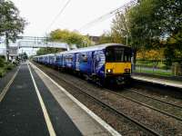 318260, leading a six coach Balloch to Airdrie service, calls at 'Baile Nighean Sheadna' on 14 October 2017. [Google translates this as 'Home Girlfriend', some mistake surely -Ed]<br>
<br>
<br><br>[David Panton 14/10/2017]