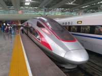 China Railways.  Shanghai Hongqiao.  The rear of train G13, the 10.00 from Beijing South, which has just arrived 6 minutes early at Shanghai Hongqiao.  The train averaged 301.6 kmh (187mph) over the 1318km with two stops at Jinan West and Nanjing South against a scheduled average of 294.8 km/h (182mph).  Given the train only twice actually reached and passed 350 kmh over the course of its journey for very short periods, the scheduled time of 4h 28m does not look taxing for the new CRH400AF units.  The ride quality at 340 kmh plus is superb but this is in part due to the excellent track.  25 September 2017<br><br>[Mark Poustie 25/09/2017]