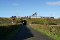 Looking west along Factory Lane, Penwortham at the WCML a short distance south of Preston as a Northern Blackpool to York 3-car refurbished Class 158 passes on 27 October 2017.<br><br>[John McIntyre 27/10/2017]