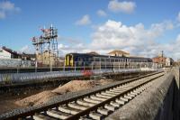 A Northern Class 156 departs from Blackpool North on 04th November, less than a week before the station shuts until March 2018. In that time the semaphore signals and Blackpool North No.2 SB will disappear as the rebuild of the station moves into the next phase. In the foreground the track is in place for the new platform 1 but is not yet connected to the running lines.<br><br>[John McIntyre 04/11/2017]