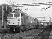 Class 87023, and an unidentified classmate, waiting in the wings at Motherwell in May 1974.<br><br>[Ian Millar /05/1974]