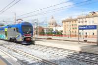 A typical Italian train unit, covered in graffiti, seen at Roma S. Pietro in 2017.<br><br>[Alastair McLellan 19/09/2017]