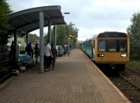 A 'nodding donkey' for Penarth calls at Pontlottyn in August 2017. The waiting shelter is very practical in the damp Valleys climate.<br><br>[Ken Strachan 19/08/2017]