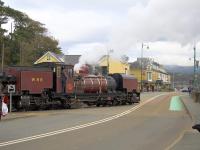 WHR loco number 138, an NGG16 Garrett, moves on to Britannia Bridge on Porthmadog's High Street in the last stage of its journey with the afternoon train from Caernarfon on 18th October 2017.<br><br>[Colin McDonald 18/10/2017]