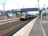 A Fife Circle line train calls at Dunfermline's Queen Margaret station in May 2005. Located on the eastern edge of Dunfermline, the station was opened in January 2000.<br><br>[John Furnevel 11/05/2005]