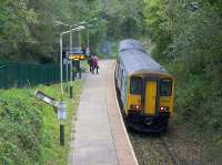 The apparently rural setting of Llanrwst station is actually close to the town centre. The station opened in 1989 and is seen here on 16th October 2017, the day after hurricane Ophelia had caused flooding and damage to the Ffestiniog Tunnel through which 150242 will be passing on its way to Blaenau Ffestiniog.<br><br>[Colin McDonald 16/10/2017]