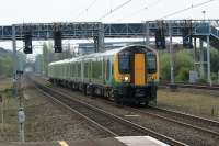 A London Midland service to Birmingham New Street with 350130 arrives at Birmingham International on 28 April 2010.<br><br>[John McIntyre 28/04/2010]