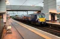 Dusk falls on Airdrie as an Edinburgh to Milngavie service calls on 1st November 2017.<br>
<br>
<br><br>[David Panton 01/11/2017]