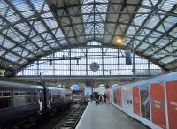 The interior of the trainshed at Liverpool Lime Street showing the hoarding blocking the view of the platform works.<br><br>[Veronica Clibbery 07/09/2017]