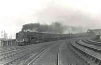 BR 'Clan' light Pacific no 72007 <I>Clan Mackintosh</I> passing Shields Bank on 26 September 1959 with a Glasgow - Stranraer train. [The box in the background is Port Eglinton Junction and Shields Bank Signal Box - on the CGU goods line to General Terminus - is behind the camera].<br><br>[G H Robin collection by courtesy of the Mitchell Library, Glasgow 26/09/1959]