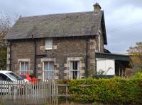 Innerleithen Station with surviving canopy. 15 October 2017. Seeing the expansion of every settlement in the valley and the growth in commuting, would the Peebles Loop be viable today as a 'basic' passenger railway with automated level crossings?  To far gone for a revival today, I'm afraid ...<br><br>[Bill Roberton 15/10/2017]