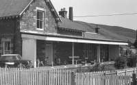 Innerleithen Station with surviving canopy.  1975. Seeing the expansion of every settlement in the valley and the growth in commuting, would the Peebles Loop be viable today as a 'basic' passenger railway with automated level crossings?  Too far gone for a revival today, I'm afraid ...<br><br>[Bill Roberton //1975]