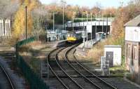 Looking west towards Shildon station from Spout Lane road bridge on 4 November 2007 as a train calls on its way to Bishop Auckland. The 13.00 ex-Saltburn is formed by Northern Pacer 142065. The Shildon NRM site is off to the left.<br><br>[John Furnevel 04/11/2007]