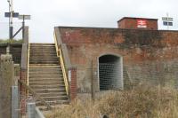 The rather uninviting entrance to Parton station between Whitehaven and Workington. The <I>Harrington Humps</I> providing level access to the trains seem a little superfluous when these stairs need to be scaled to reach the trains, although in fairness the platforms are very low indeed. 13th November 2017. [Ref query 14 November 2017]<br><br>[Mark Bartlett 13/11/2017]