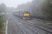 West Coast EE Type 3 37518 seen at Maryhill with 'The Jacobite' empty coaching stock returning to Carnforth on 31st October 2017. <br>
<br><br>[Alastair McLellan 31/10/2017]