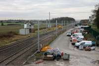 The scene at Salwick on 15th November 2017, five days into the Blackpool line closure. This has been an electrification work site for some time now. The signal box is still in place, although it will be demolished in due course, and the masts have now been erected. [See image 45862] for an earlier view of the same location.  <br><br>[Mark Bartlett 15/11/2017]