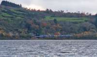 Eastbound train approaching Langbank. It has just passed over the old bridge over the Greenock road and is about to pass over the girder bridge over the A8.<br><br>[Ewan Crawford 08/11/2017]