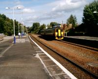 A Scotrail Class 156 arrives at Dumfries whilst on a Glasgow to Carlisle service on 22 September 2006.<br><br>[John McIntyre 22/09/2006]