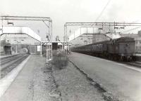 Looking east at Dalmuir Park on 23 June 1959 as a Springburn - Balloch train pauses at platform 1 behind Parkhead V3 2-6-2T no 67662.<br><br>[G H Robin collection by courtesy of the Mitchell Library, Glasgow 23/06/1959]