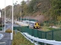 The 0955 ex-Waverley leaving the platform at Galashiels on 9 November 2017 on the last short leg of its journey to Tweedbank. Meantime, in the background, the last of the newly arrived passengers crosses the A7 Ladhope Vale to reach the Interchange building - notwithstanding the traffic signals!<br><br>[John Furnevel 09/11/2017]