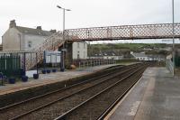 <I>Harrington Humps</I> are now used at smaller stations with low platforms across the UK network but this is where they were first installed. This view looks south at the unstaffed Cumbrian Coast halt at Harrington on 13th November 2017.<br><br>[Mark Bartlett 13/11/2017]