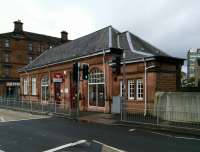 The street-level buildings at Greenock West, seen on 14 November. The station boasts a cafe; this (surprisingly?) must pay its way as it's been here for some years.<br><br>[David Panton 14/11/2017]