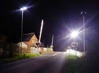 Approaching Mansfield Road level crossing, to the west of Retford on the line to Worksop, on a freezing Saturday night on 18th November 2017. Looking at the rails there was evidence of a recent visit from a rail grinder. [Ref query 21 November 2017]<br>
<br><br>[Alan Cormack 18/11/2017]