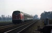 DB 220 065 heads north between Lingen and Meppen at Km post 251.5 in April 1976.<br><br>[John McIntyre /04/1976]