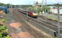 DVT 82132 leads a Waverley - North Berwick service through Portobello in the summer of 2004 during the period when Virgin locomotive hauled stock was being used to cover for EMU shortages. Propelling the train at the rear is EWS 90033.<br><br>[John Furnevel 26/07/2004]