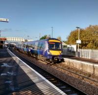 A Dunblane to Edinburgh service calls at Camelon on 16 November 2017. The OHLE<br>
masts are up either side, but the trickier task of masting up the station has not yet started.<br>
<br>
<br><br>[David Panton 16/11/2017]