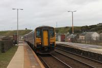 153301 is on the rear of a two-car set as it departs Parton heading for Carlisle on 13th November 2017. You can see by how much of the train underframe is showing that the platforms at Parton are particularly low but the <I>Harrington Humps</I> have allowed services to continue without great expense. <br><br>[Mark Bartlett 13/11/2017]