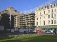 The scaffolding being erected around the Milennium Hotel extension blends in with the Christmas lights in George Square in this view from mid November 2017.<br><br>[Colin McDonald 18/11/2017]