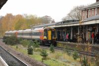 South Western Railway 159017, still in Stagecoach livery, seen west bound at Andover station with another 3-car unit on 18th November 2017.<br>
<br><br>[Peter Todd 18/11/2017]