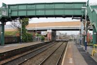 The rebuilt Crossleys Bridge at Layton station has reopened to road traffic but it will be late March 2018 before trains are regularly passing underneath it again. This photo taken on 21st November 2017 shows the Carleton Crossing distant still standing defiantly, although the signal box was being dismantled. [See image 55384] showing the old bridge before demolition. <br><br>[Mark Bartlett 21/11/2017]