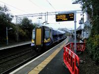 A newly installed information screen announces the 1141 service to Glasgow Central on 14 November. The fine building lives on, though the station is unstaffed.<br><br>[David Panton 14/11/2017]