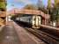 An East Kilbride train calls at Giffnock on 11 November 2017. The fine<br>
footbridge would be a casualty of electrification, but it would be a price<br>
worth paying, I think.<br>
<br>
<br><br>[David Panton 11/11/2017]
