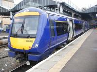 170416, devoid of branding, on arrival at Inverness at 1027 having formed the<br>
0710 from Glasgow Queen Street. According to one of the rail forums 170416<br>
collided with a large bull near Nairn back in October 2016. It then may have<br>
suffered further damage in a collision at the Broxden Roundabout while being<br>
taken by road for repairs, first at Shields and then at Kilmarnock. [See image 30516]<br>
for a view of the unit in First livery.<br>
<br>
<br><br>[Douglas Blades 22/11/2017]