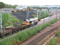 ZA723, alias GBRf 66723 <I>Chinook</I> [see image 34380] arrives at the north end of Millerhill Yard with a ballast train from Cambuslang on 24 September 2017. Sunday morning construction work is taking place on the new ScotRail EMU depot in the background. <br><br>[John Furnevel 24/09/2017]