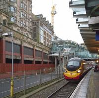 A Virgin Trains Pendolino stands at Waverley platform 8 on 2 December 2017 with the Saturday 1052 service to London Euston.<br><br>[Andy Furnevel 02/12/2017]