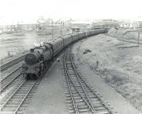 BR Standard class 4 2-6-4T no 80129 approaching Ardrossan North on 5 July 1959 with a train for Montgomerie Pier. <br><br>[G H Robin collection by courtesy of the Mitchell Library, Glasgow 05/07/1959]