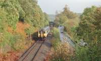 The notorious narrow road bridge west of Loch Awe station, seen from the west with an Oban bound 156 approaching the camera. The view is from 1991, before the traffic lights were installed on the bridge.<br><br>[Ewan Crawford //1991]