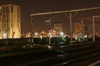 The Salford skyline at night viewed from the west end of Salford Central station on 27 November 2017. Slightly left of centre of the photo, the new Ordsall bridge can be seen. Although the tracks on the lines to Ordsall Jct have been realigned through the disused platforms, work hasn't yet started to address the 'mountaineering' required to board and alight from trains on the platforms towards Salford Crescent.<br><br>[John McIntyre 27/11/2017]