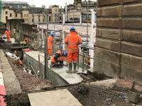 View through the fence at the work in progress on North Hanover Street in December 2017, where it appears that there will be an entrance to the new staff buildings which are under construction.<br><br>[Colin McDonald 01/12/2017]