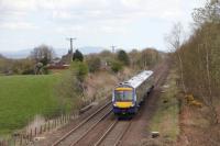 An image taken from Dykehead Farm overbridge on 27th April 2015. Between 170415 and the red signal was the location of High Bonnybridge (Bonnybridge High) station. To the right of the unit was a trailing junction feeding the Bonnybridge Silica and fireclay works (The Silica).<br>
<br>
<br><br>[Douglas McPherson 27/04/2015]